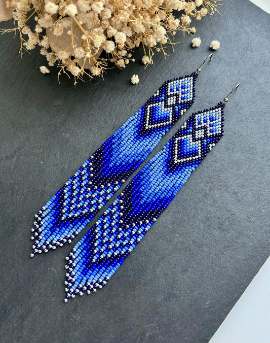 Handmade long blue beaded boho earrings with fringe and silver accents. Native style statement jewelry, unique artisanal accessory for bold style image 2