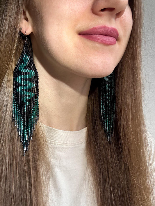 Handmade long beaded earrings with green snake design in boho style. Unique statement jewelry with fringe, perfect gift and standout accessory for any look image 2