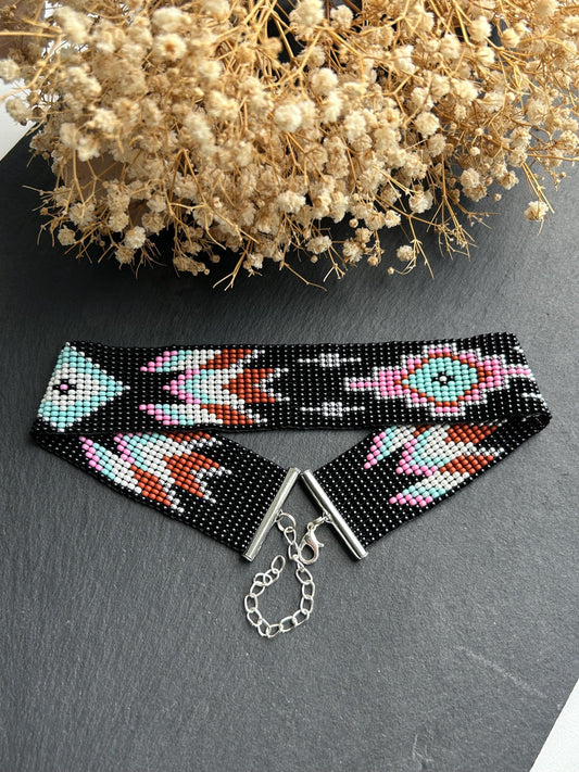 Unique handmade black beaded choker with geometric ornament in turquoise, pink, beige, and silver tones. Native American style boho statement choker necklace with adjustable chain image 2