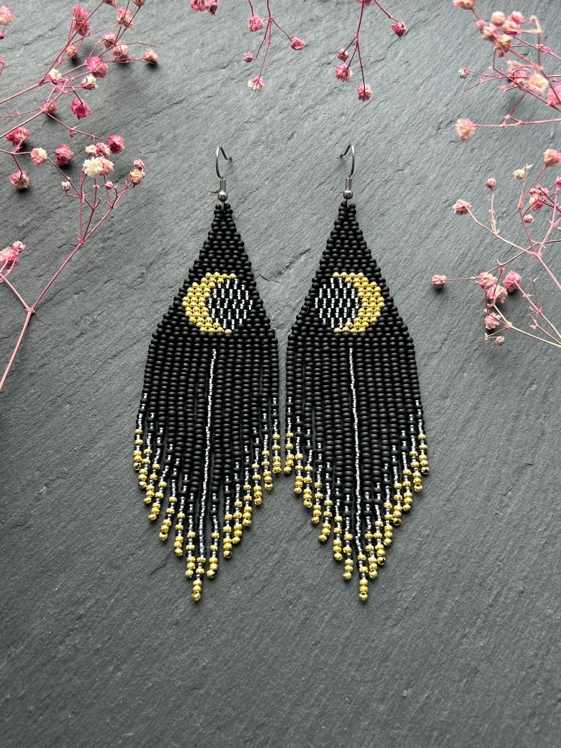 Handmade long black beaded earrings with golden lunar eclipse design and boho fringe. Unique statement jewelry image 1