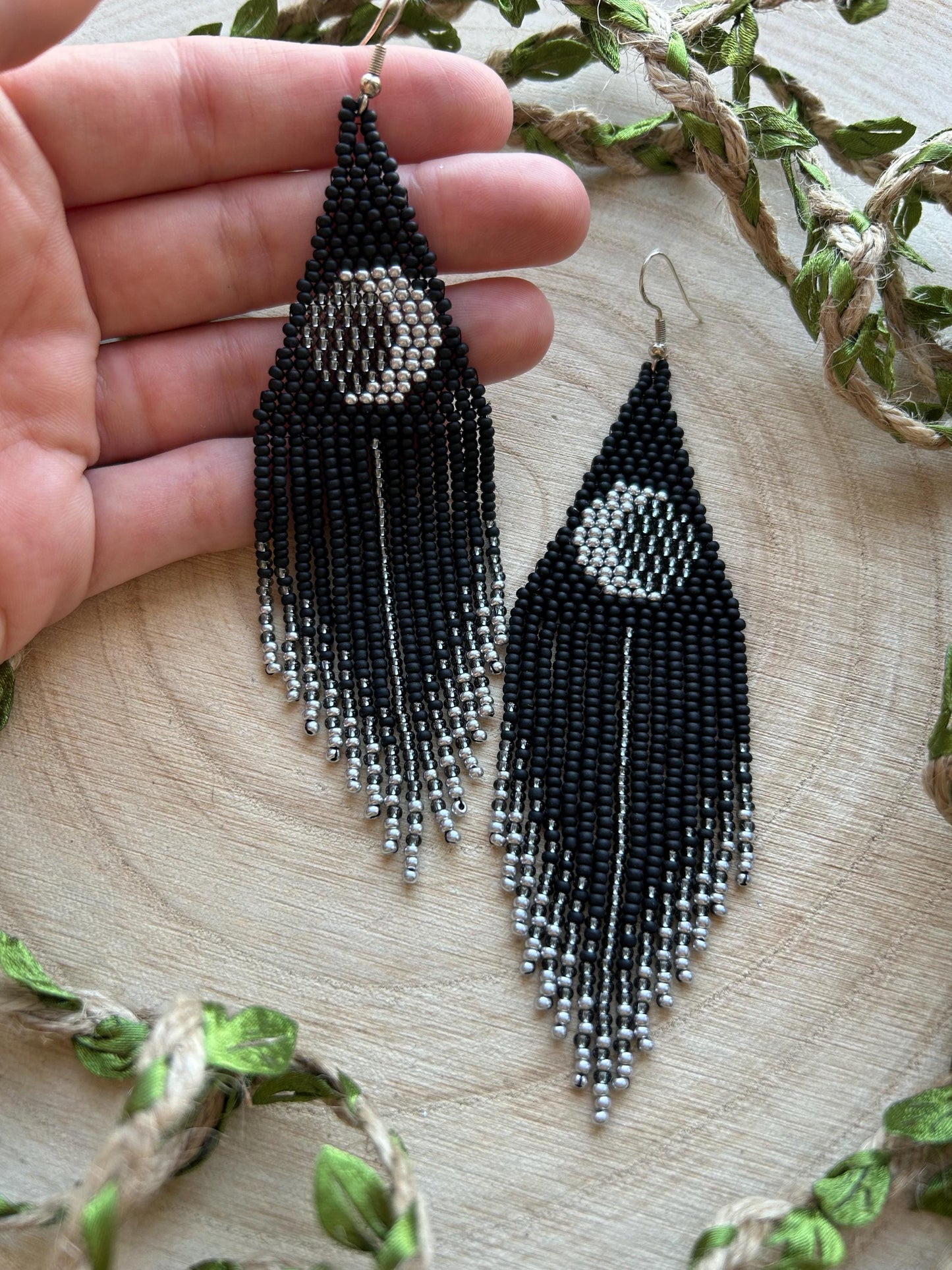Unique handmade black beaded earrings with silver lunar eclipse motif and fringe. Boho celestial statement jewelry for mystical and artistic style image 6