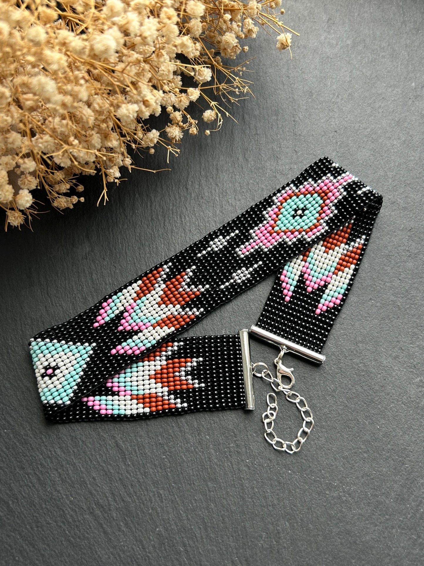 Unique handmade black beaded choker with geometric ornament in turquoise, pink, beige, and silver tones. Native American style boho statement choker necklace with adjustable chain image 10