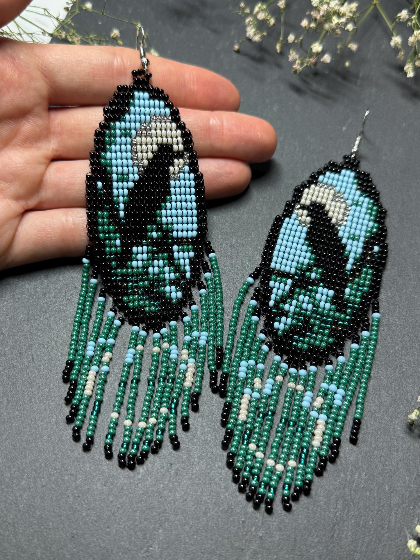 Long handmade beaded earrings in black, green, blue and beige featuring a raven and moon design with fringe. Boho statement jewelry, unique gift for her image 6
