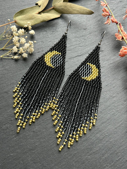 Handmade long black beaded earrings with golden lunar eclipse design and boho fringe. Unique statement jewelry image 8