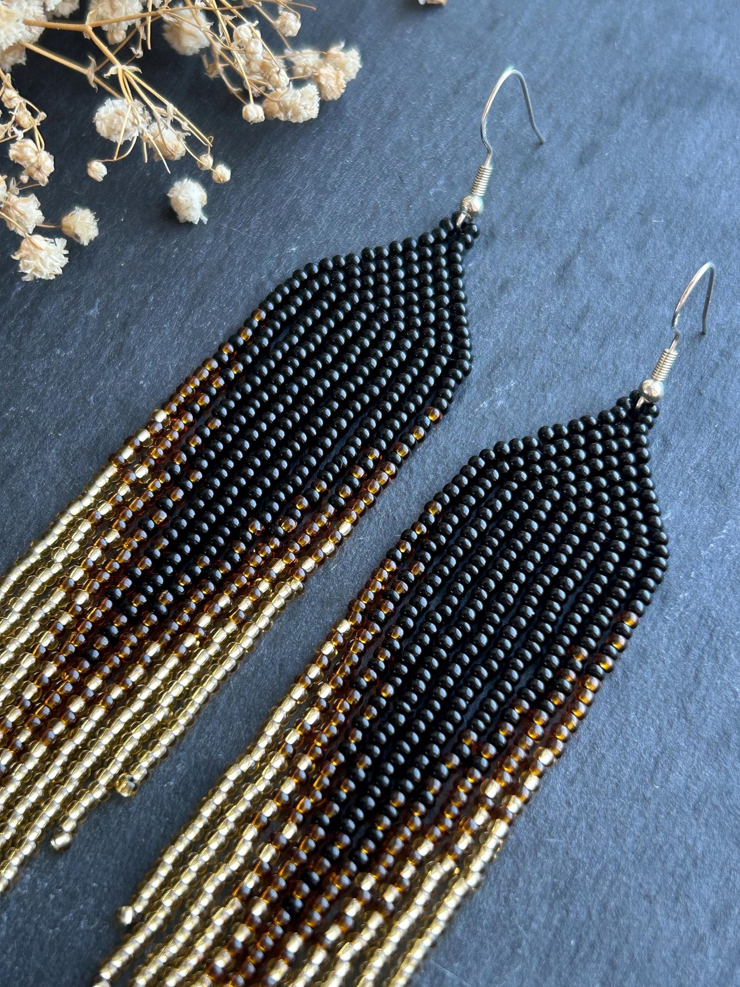 Handmade black beaded earrings with gold ombre and boho fringe. Unique statement jewelry with elegant shimmer, perfect gift for lovers of artisan style image 3