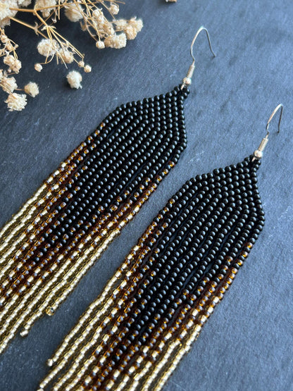 Handmade black beaded earrings with gold ombre and boho fringe. Unique statement jewelry with elegant shimmer, perfect gift for lovers of artisan style image 3