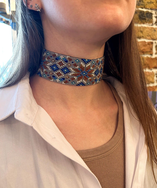 Unique handmade beaded choker with brown star ornament and blue accents on transparent base. Unique boho statement choker necklace for standout style image 1