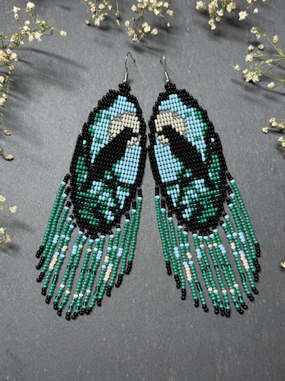 Long handmade beaded earrings in black, green, blue and beige featuring a raven and moon design with fringe. Boho statement jewelry, unique gift for her image 9