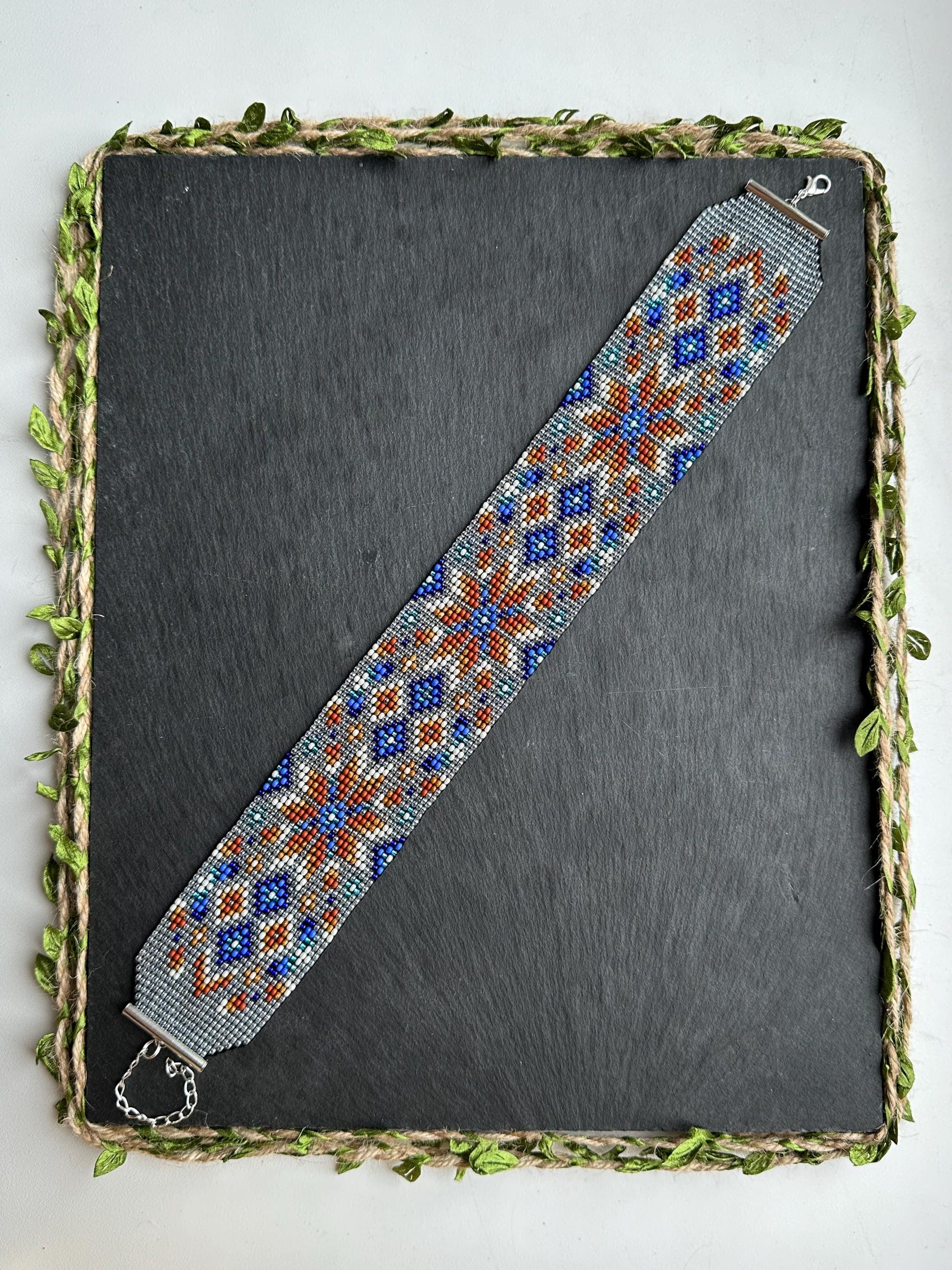 Unique handmade beaded choker with brown star ornament and blue accents on transparent base. Unique boho statement choker necklace for standout style image 3