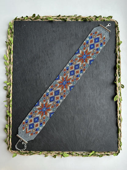 Unique handmade beaded choker with brown star ornament and blue accents on transparent base. Unique boho statement choker necklace for standout style image 3