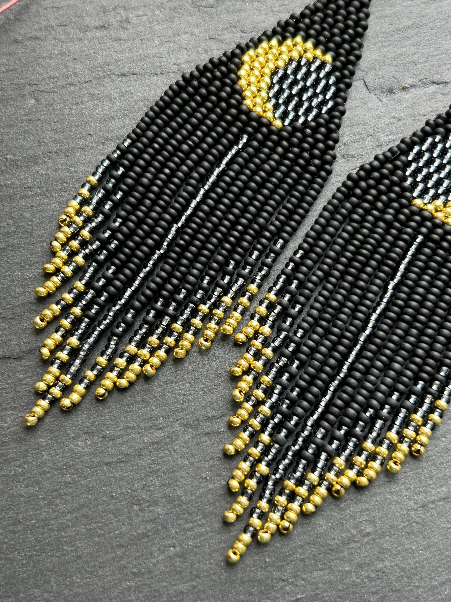 Handmade long black beaded earrings with golden lunar eclipse design and boho fringe. Unique statement jewelry image 4