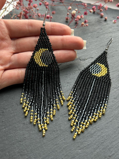 Handmade long black beaded earrings with golden lunar eclipse design and boho fringe. Unique statement jewelry image 5