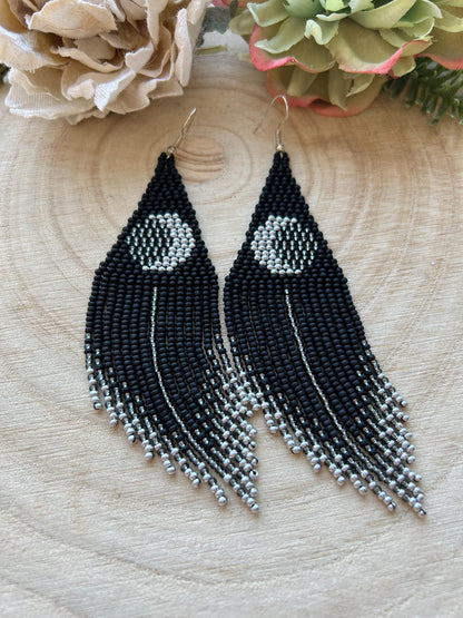 Unique handmade black beaded earrings with silver lunar eclipse motif and fringe. Boho celestial statement jewelry for mystical and artistic style image 7