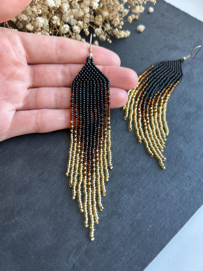 Handmade black beaded earrings with gold ombre and boho fringe. Unique statement jewelry with elegant shimmer, perfect gift for lovers of artisan style image 5
