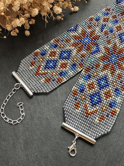 Unique handmade beaded choker with brown star ornament and blue accents on transparent base. Unique boho statement choker necklace for standout style image 6