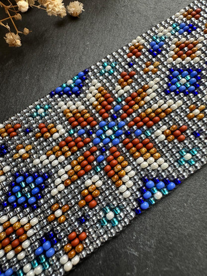 Unique handmade beaded choker with brown star ornament and blue accents on transparent base. Unique boho statement choker necklace for standout style image 4