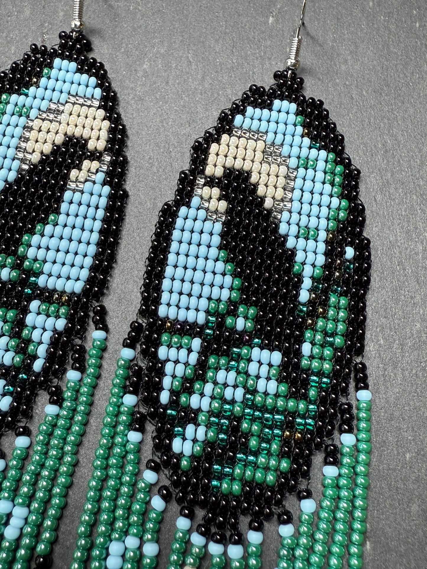Long handmade beaded earrings in black, green, blue and beige featuring a raven and moon design with fringe. Boho statement jewelry, unique gift for her image 7