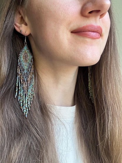 Handmade long beaded earrings in turquoise, green, and brown with fringe. Native American boho statement jewelry, unique artisanal accessory and perfect gift image 2