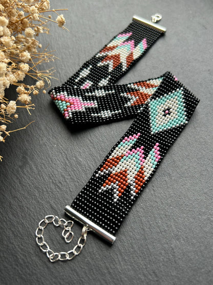 Unique handmade black beaded choker with geometric ornament in turquoise, pink, beige, and silver tones. Native American style boho statement choker necklace with adjustable chain image 9