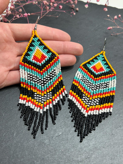 Bright handmade beaded fringe earrings in black, white, turquoise, red and orange with Native American motif. Statement boho earrings for women, perfect gift image 6