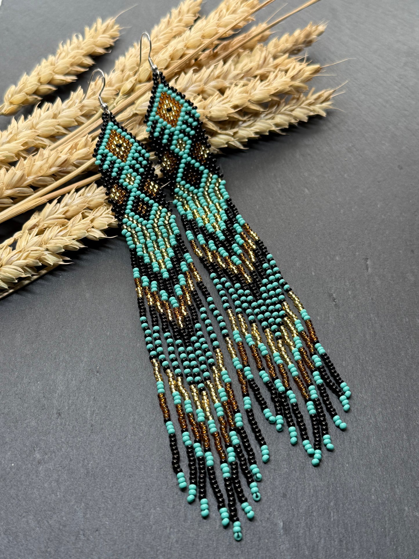 Handmade long black, turquoise, and gold beaded earrings with Native American ethnic design and fringe. Unique boho statement earrings for women image 16