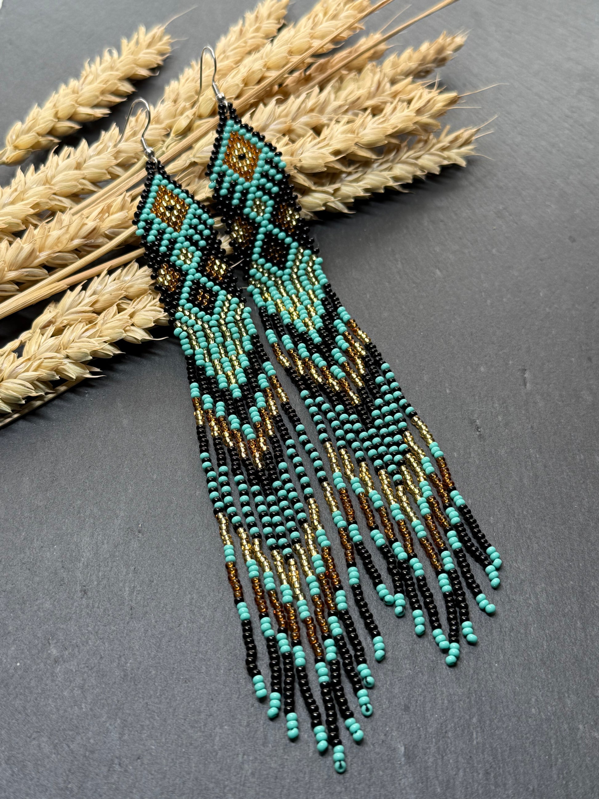 Handmade long black, turquoise, and gold beaded earrings with Native American ethnic design and fringe. Unique boho statement earrings for women image 16