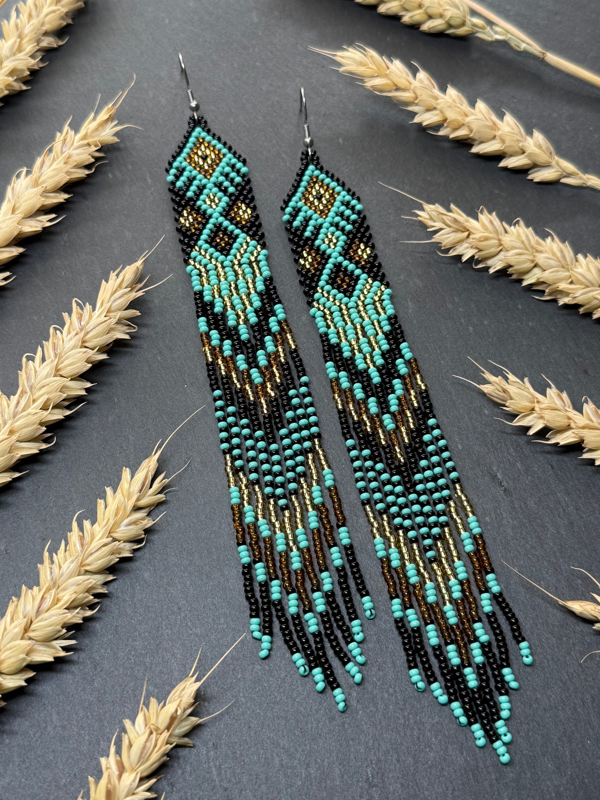 Handmade long black, turquoise, and gold beaded earrings with Native American ethnic design and fringe. Unique boho statement earrings for women image 15