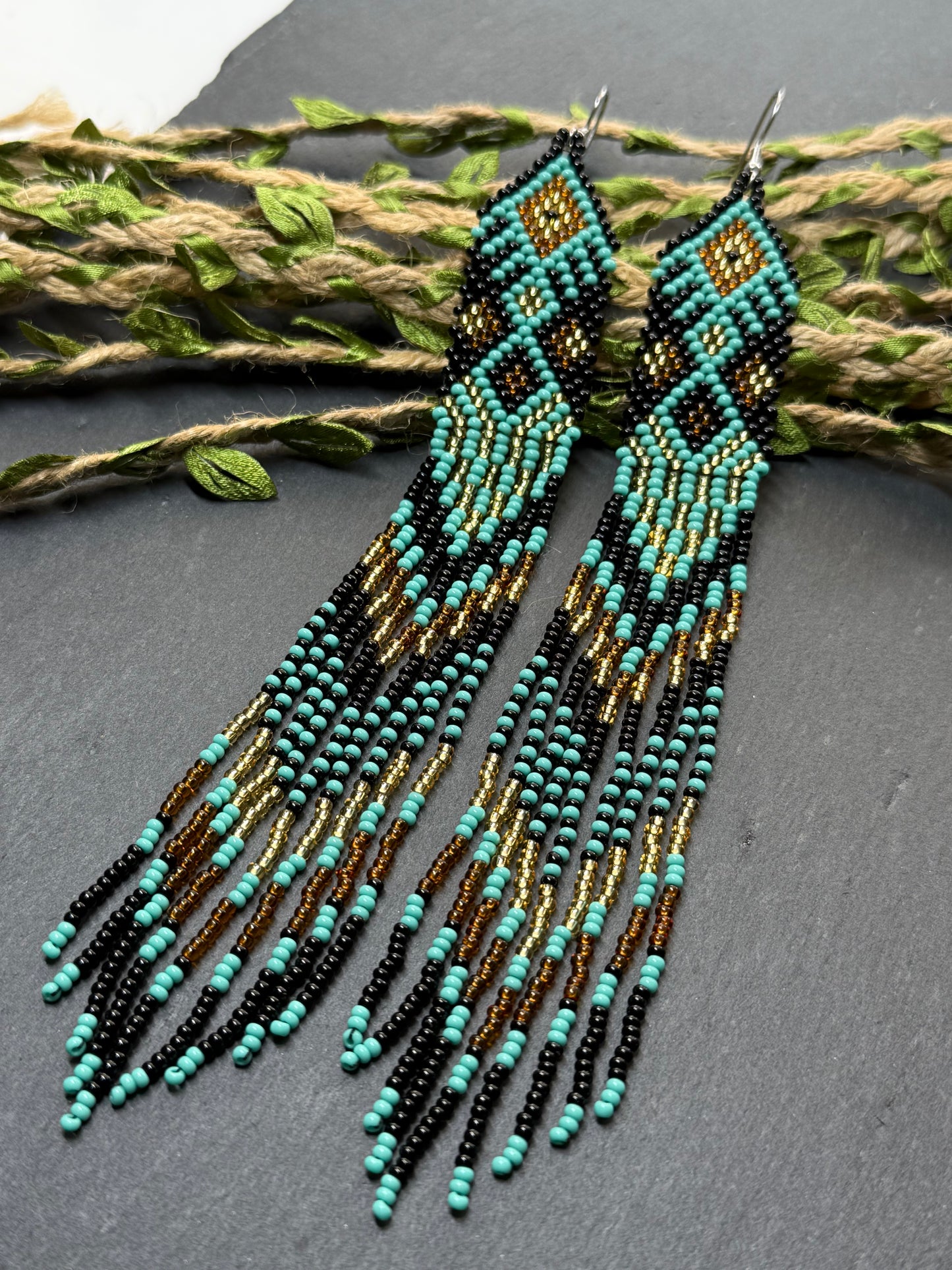 Handmade long black, turquoise, and gold beaded earrings with Native American ethnic design and fringe. Unique boho statement earrings for women image 18