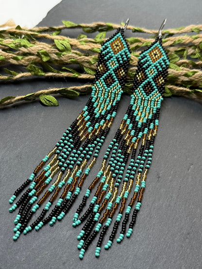 Handmade long black, turquoise, and gold beaded earrings with Native American ethnic design and fringe. Unique boho statement earrings for women image 18