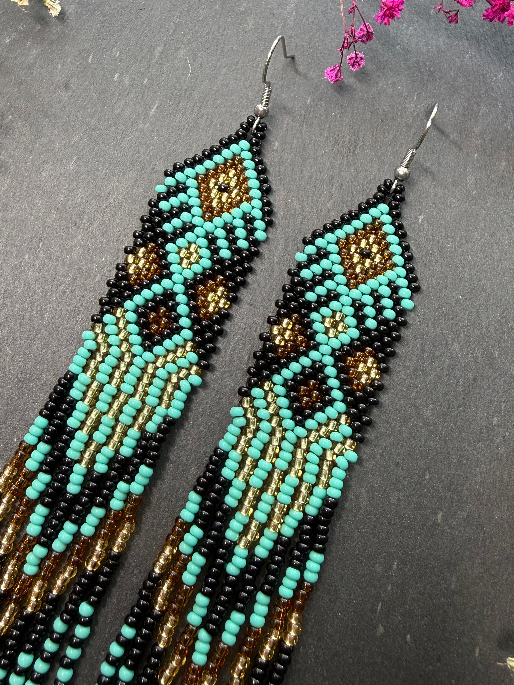 Handmade long black, turquoise, and gold beaded earrings with Native American ethnic design and fringe. Unique boho statement earrings for women image 5