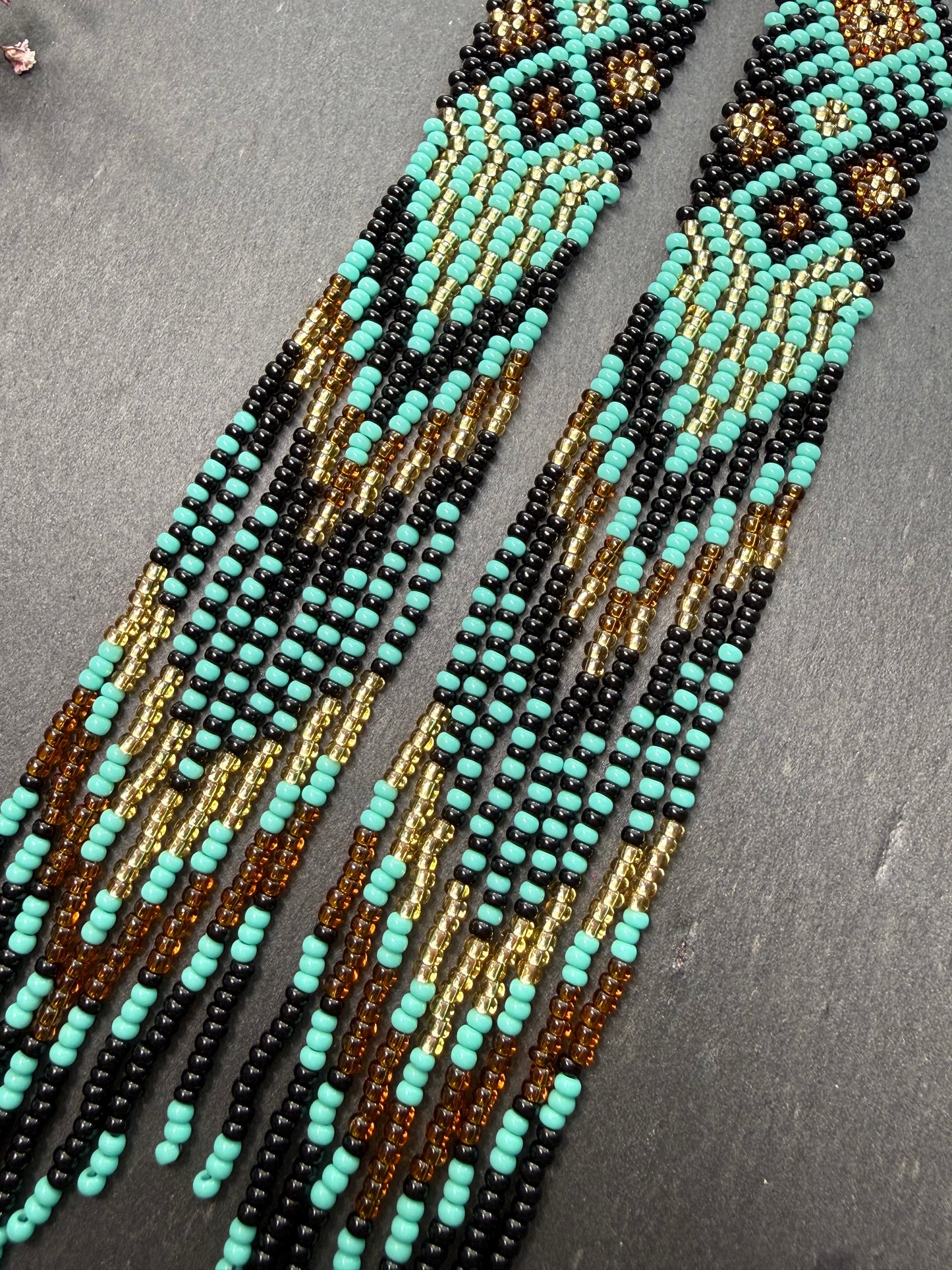Handmade long black, turquoise, and gold beaded earrings with Native American ethnic design and fringe. Unique boho statement earrings for women image 6
