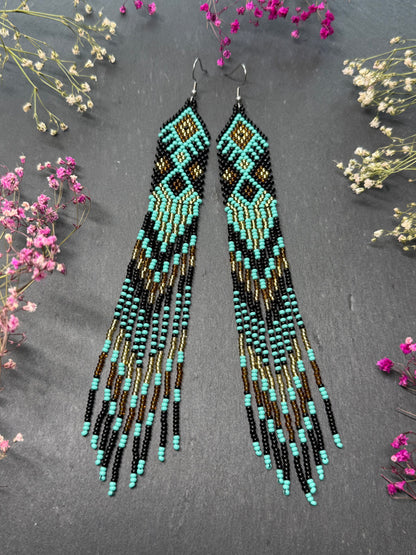 Handmade long black, turquoise, and gold beaded earrings with Native American ethnic design and fringe. Unique boho statement earrings for women image 10