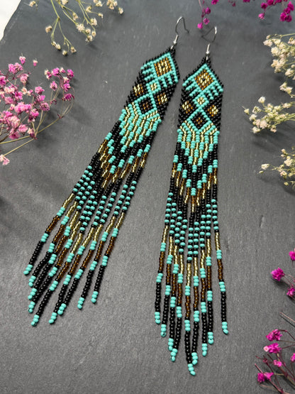 Handmade long black, turquoise, and gold beaded earrings with Native American ethnic design and fringe. Unique boho statement earrings for women image 12