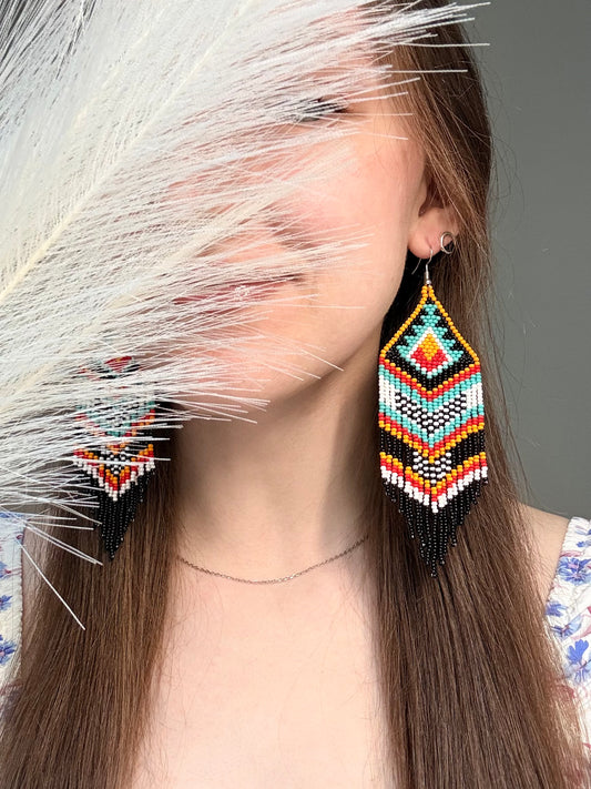 Bright handmade beaded fringe earrings in black, white, turquoise, red and orange with Native American motif. Statement boho earrings for women, perfect gift image 2