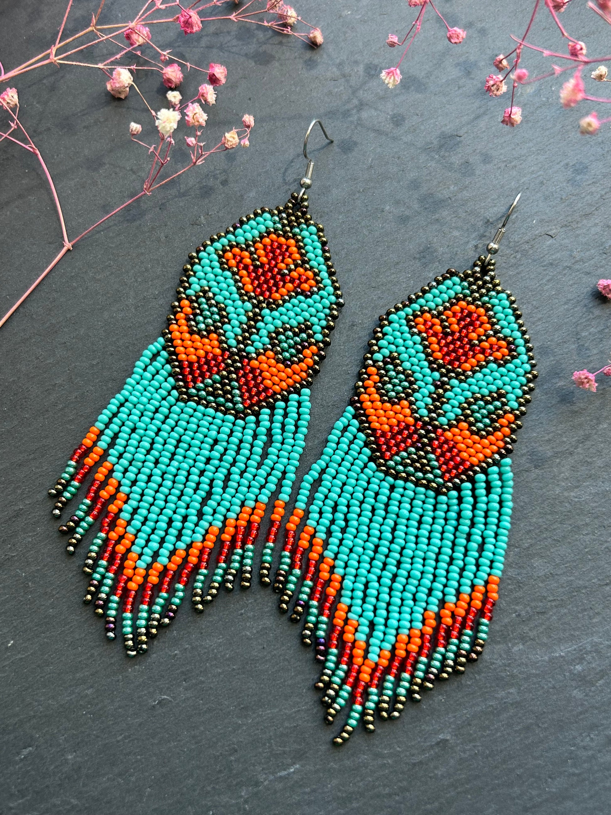 Unique handmade long beaded earrings in turquoise, orange, and red with floral design and fringe. Boho statement jewelry, cute multicolor earrings for women image 3