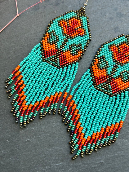 Unique handmade long beaded earrings in turquoise, orange, and red with floral design and fringe. Boho statement jewelry, cute multicolor earrings for women image 5