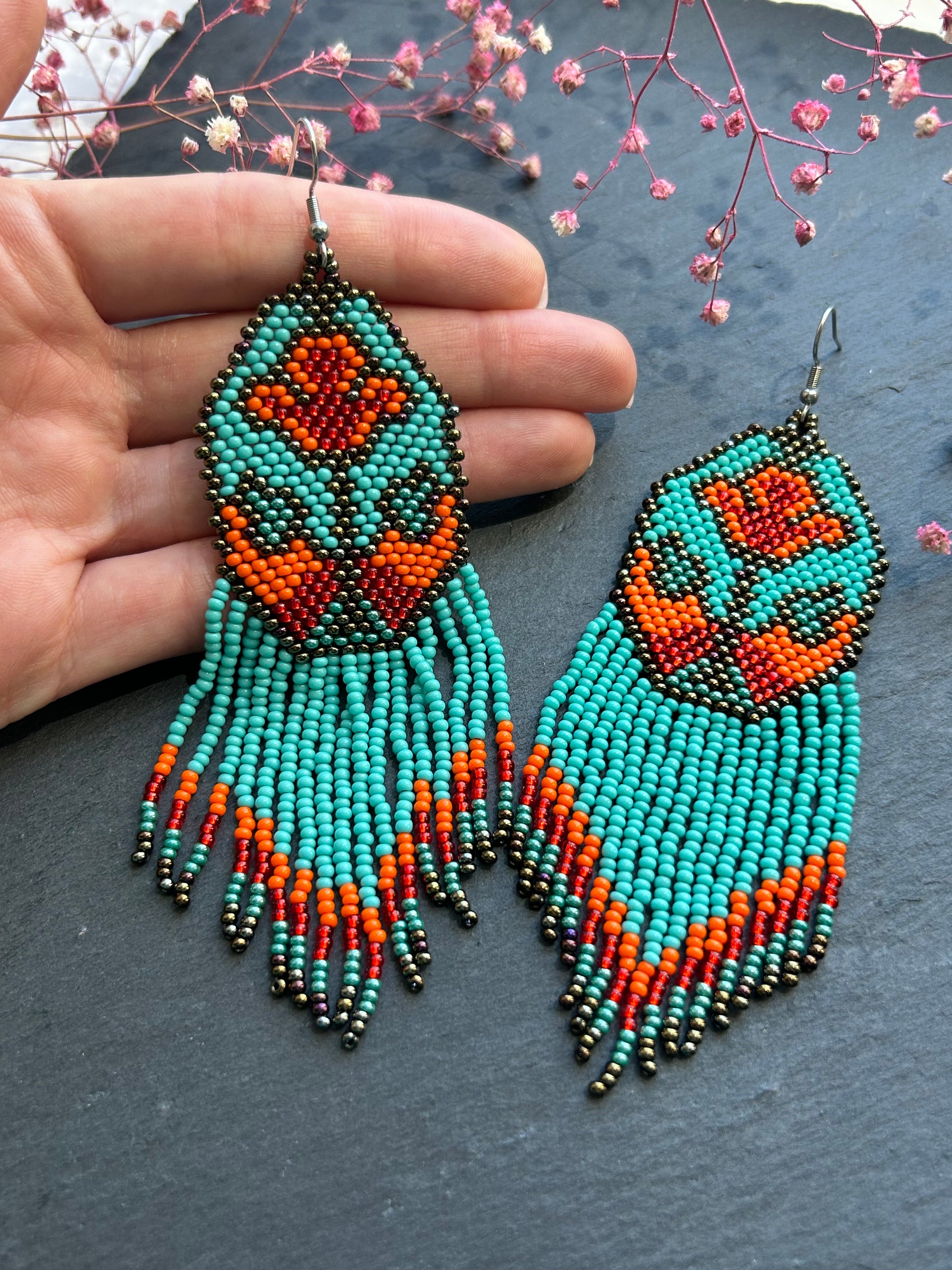 Unique handmade long beaded earrings in turquoise, orange, and red with floral design and fringe. Boho statement jewelry, cute multicolor earrings for women image 6