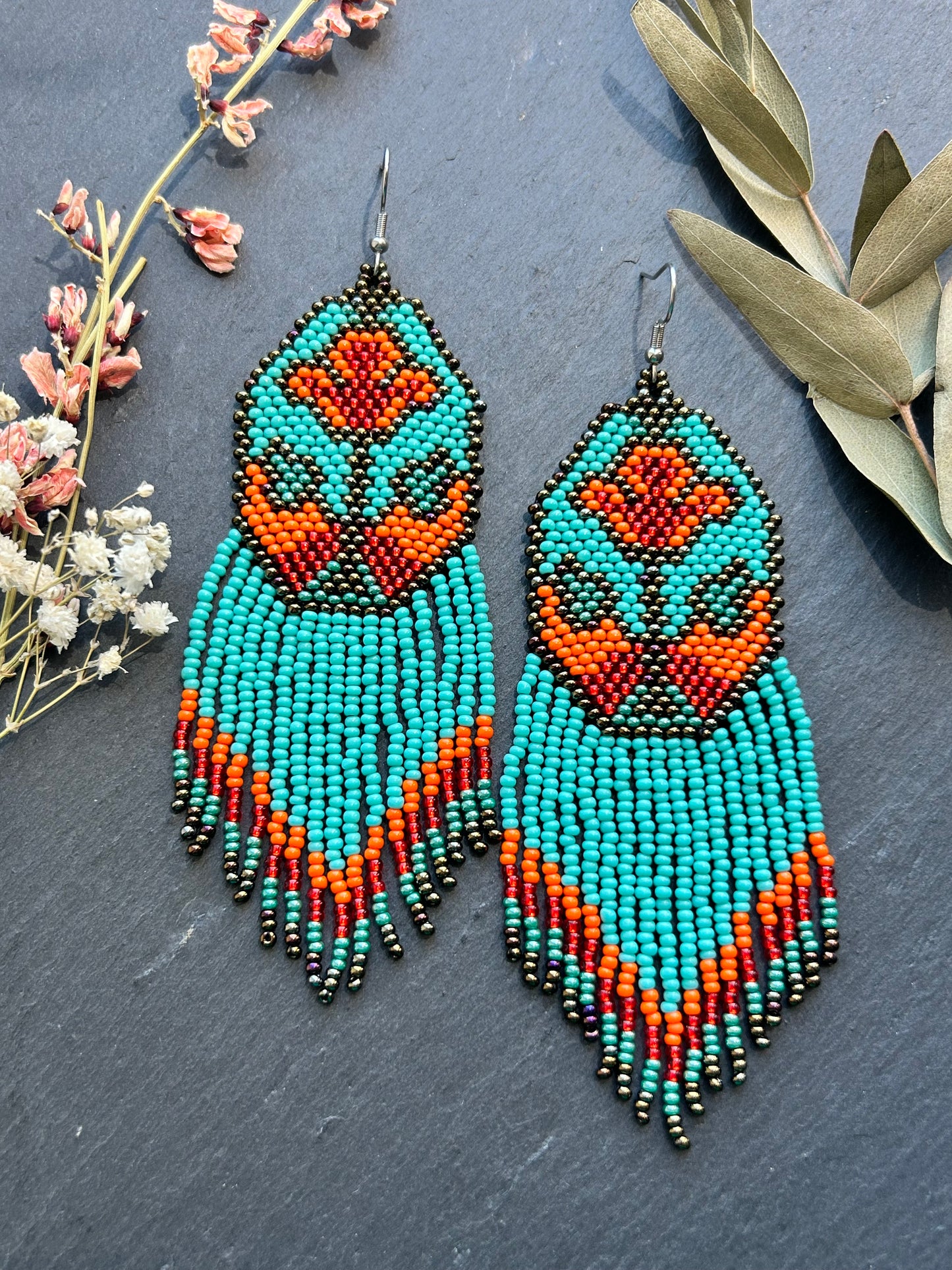 Unique handmade long beaded earrings in turquoise, orange, and red with floral design and fringe. Boho statement jewelry, cute multicolor earrings for women image 8