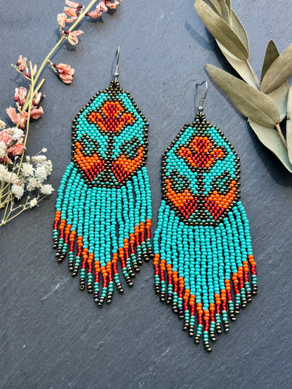 Unique handmade long beaded earrings in turquoise, orange, and red with floral design and fringe. Boho statement jewelry, cute multicolor earrings for women image 8
