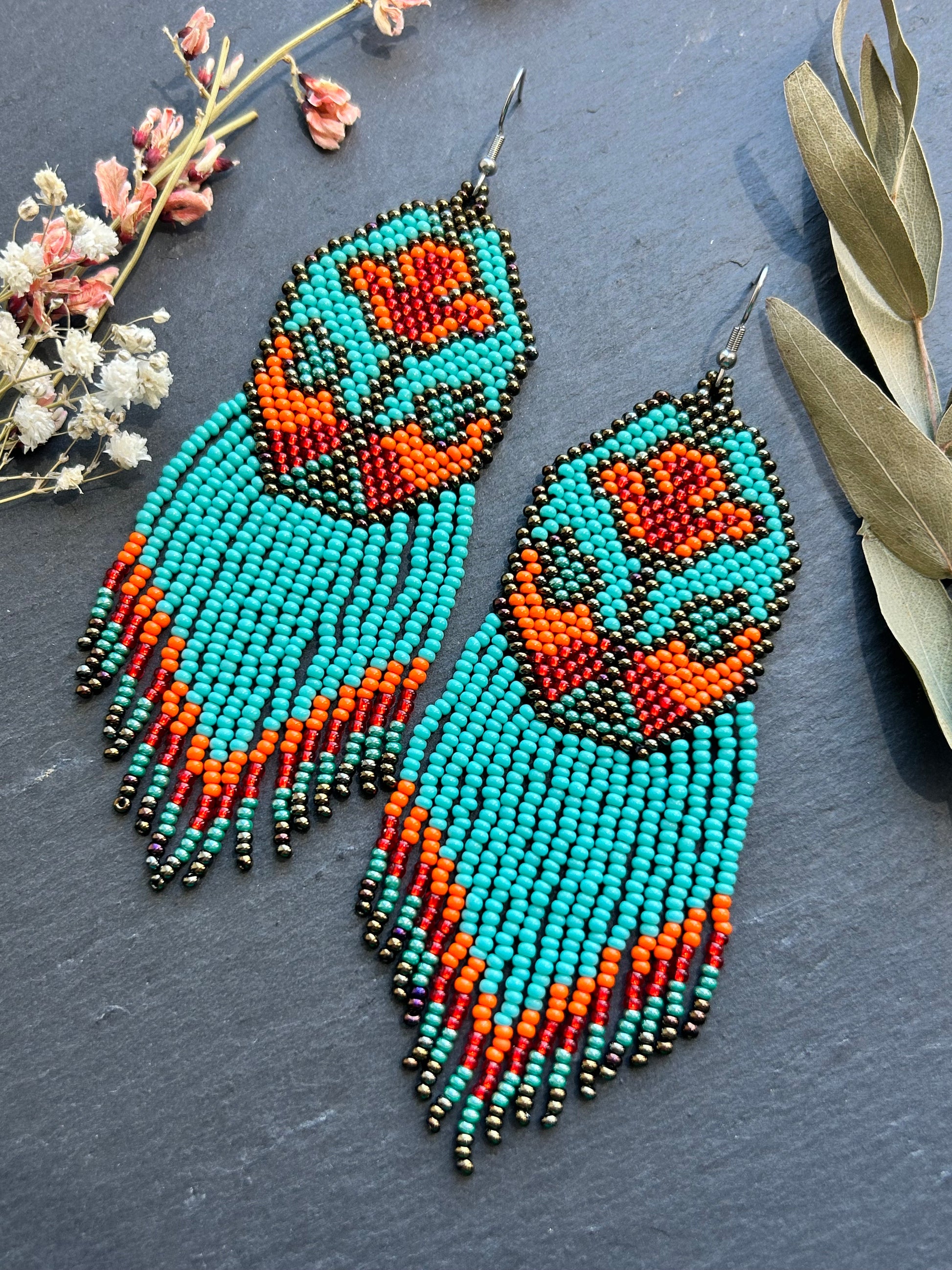 Unique handmade long beaded earrings in turquoise, orange, and red with floral design and fringe. Boho statement jewelry, cute multicolor earrings for women image 9
