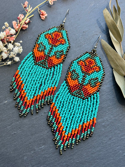 Unique handmade long beaded earrings in turquoise, orange, and red with floral design and fringe. Boho statement jewelry, cute multicolor earrings for women image 9