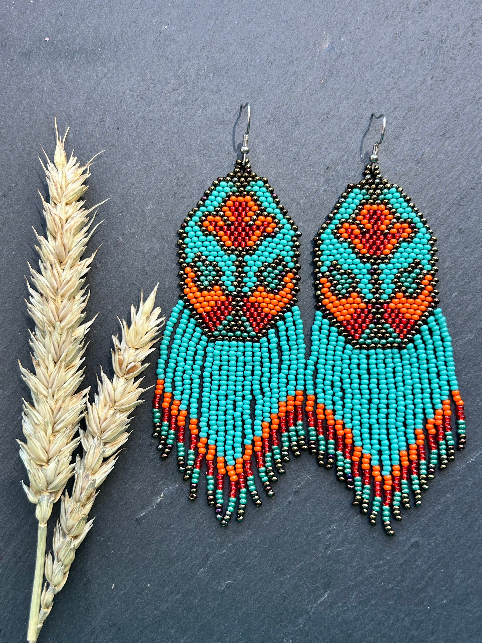 Unique handmade long beaded earrings in turquoise, orange, and red with floral design and fringe. Boho statement jewelry, cute multicolor earrings for women image 10