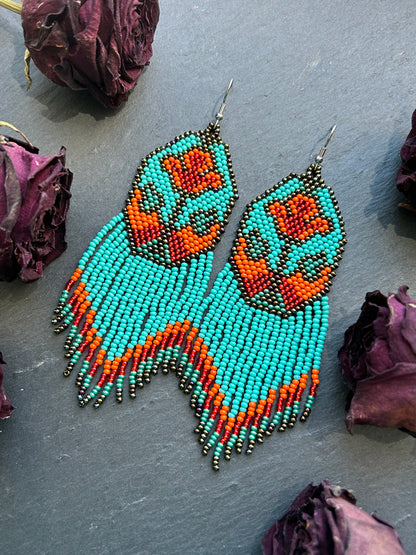 Unique handmade long beaded earrings in turquoise, orange, and red with floral design and fringe. Boho statement jewelry, cute multicolor earrings for women image 12
