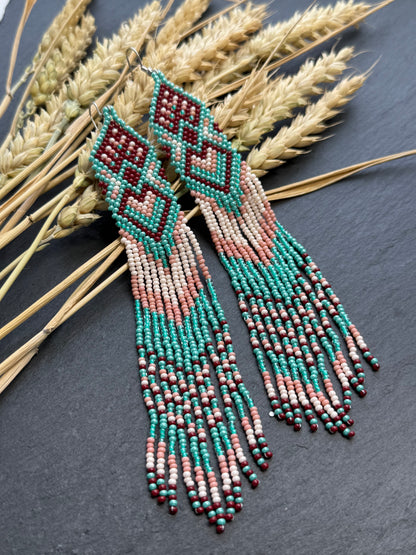 Unique handmade beaded dangle earrings with Native American motif in turquoise, beige and burgundy. Bright boho statement earrings for women, perfect gift image 1