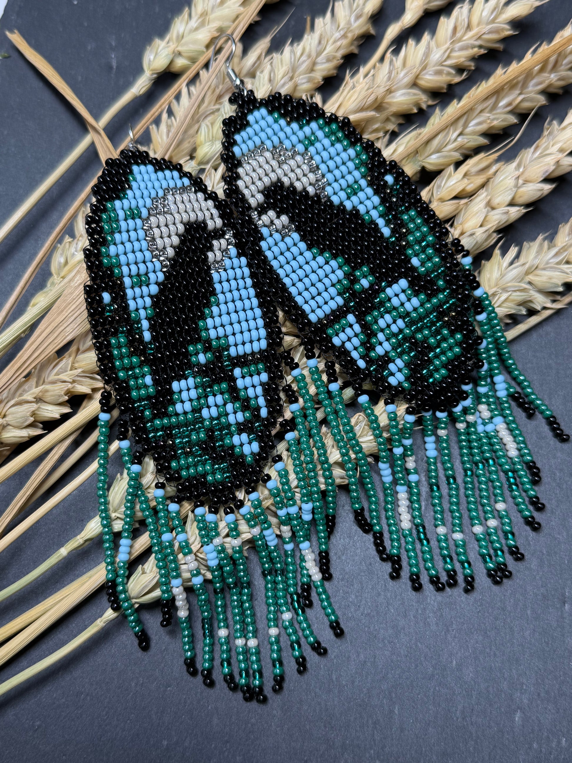 Long handmade beaded earrings in black, green, blue and beige featuring a raven and moon design with fringe. Boho statement jewelry, unique gift for her image 10