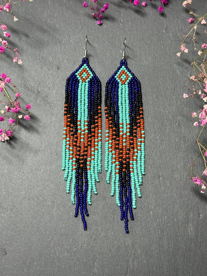 Bright blue, black, brown, and turquoise handmade beaded fringe earrings for women. Unique boho jewelry and statement beadwork, perfect native gift for women image 1