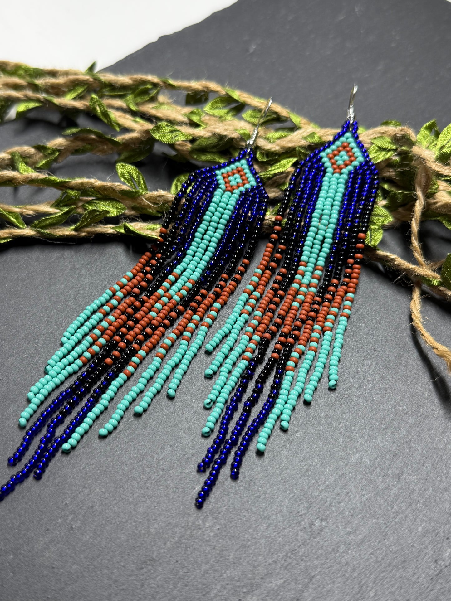Bright blue, black, brown, and turquoise handmade beaded fringe earrings for women. Unique boho jewelry and statement beadwork, perfect native gift for women image 11