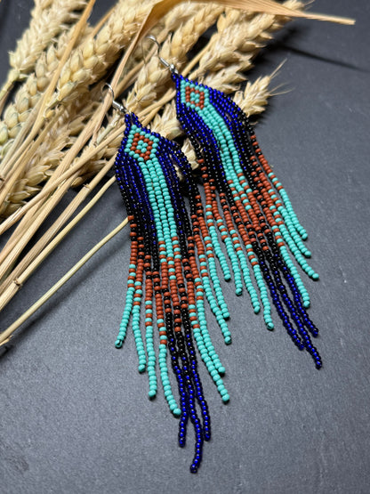Bright blue, black, brown, and turquoise handmade beaded fringe earrings for women. Unique boho jewelry and statement beadwork, perfect native gift for women image 13