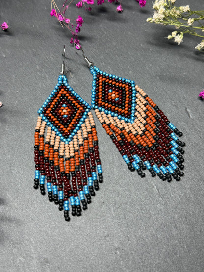 Handmade blue and brown beaded fringe earrings with geometric style. Unique bright boho statement jewelry with Native-inspired design and artisan beadwork image 9