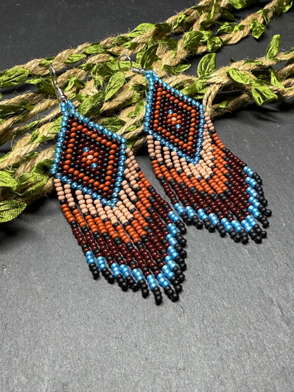 Handmade blue and brown beaded fringe earrings with geometric style. Unique bright boho statement jewelry with Native-inspired design and artisan beadwork image 12